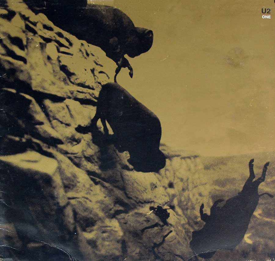 Front Cover Photo Of U2 - One / Lady with the Spinning Head