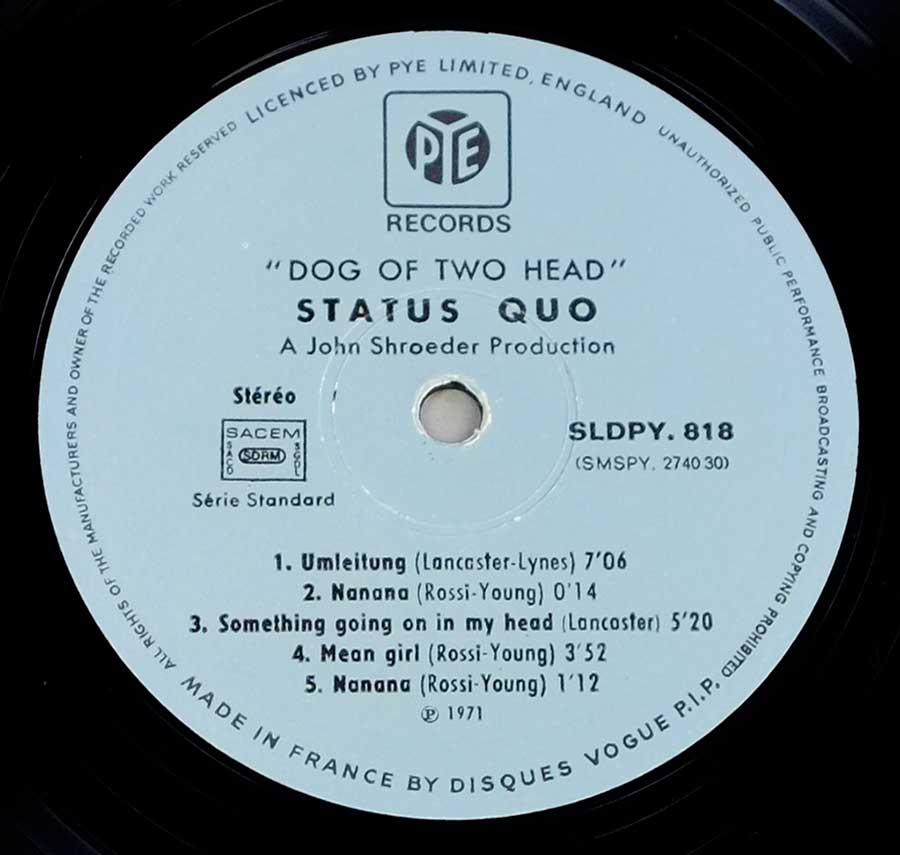 Close up of record's label STATUS QUO - Dog of Two Head ( Gatefold Cover ) Side One