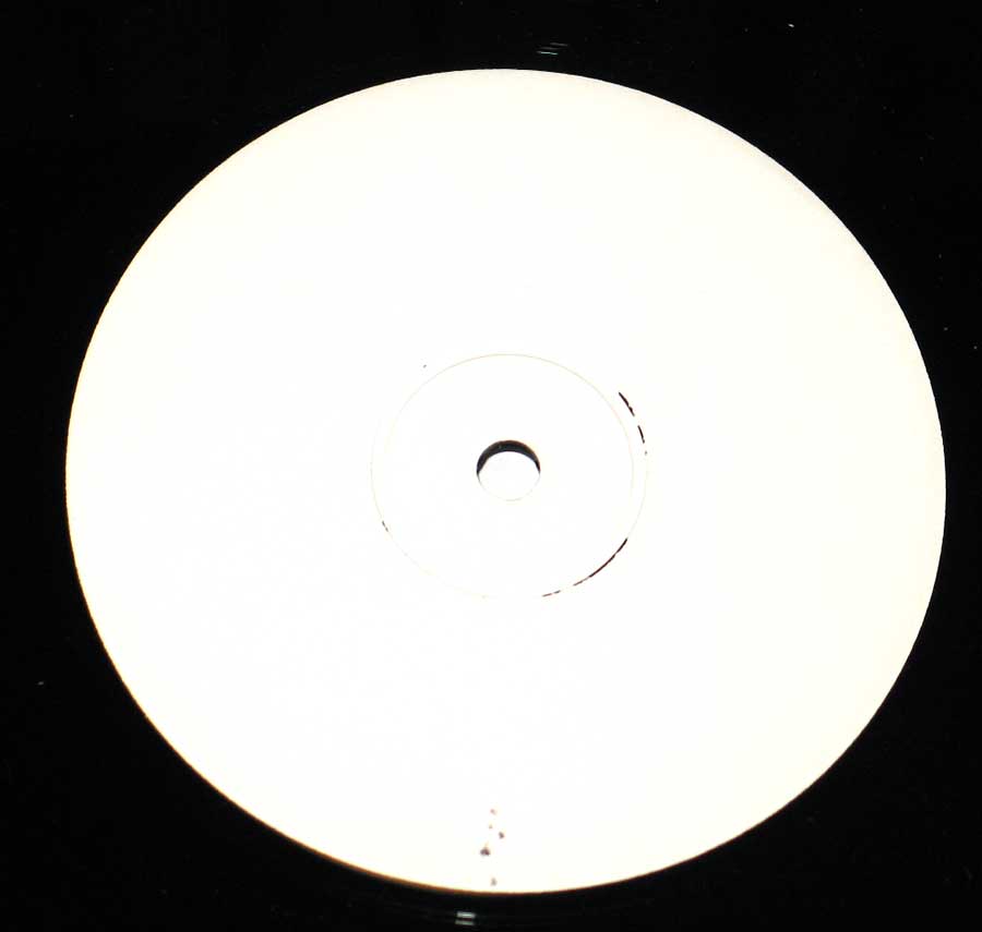 Close up of record's label ROLLING STONES - Stoned Again By The Rockers White WLP Side One