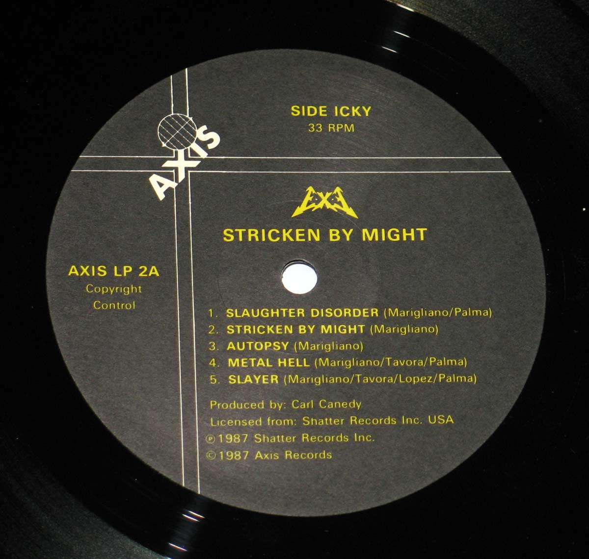 Close-up Photo of "EXE - Stricken by Might" Record Label  

