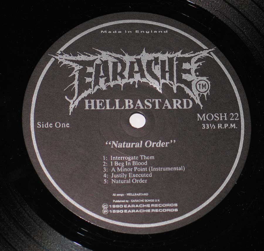 Close up of record's label HELLBASTARD - NATURAL ORDER 12" Vinyl LP Album Side One