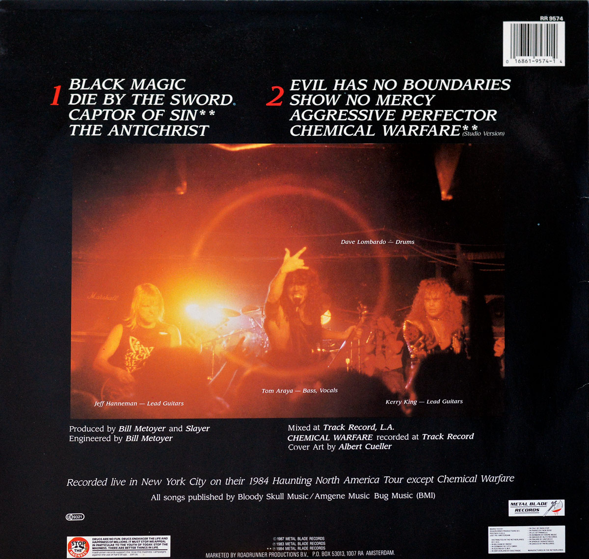 Back cover of Slayer's 'Live Undead' album. Features tracklist in bold red and white text, a live concert photo of the band bathed in red-orange stage lighting, and production credits at the bottom.