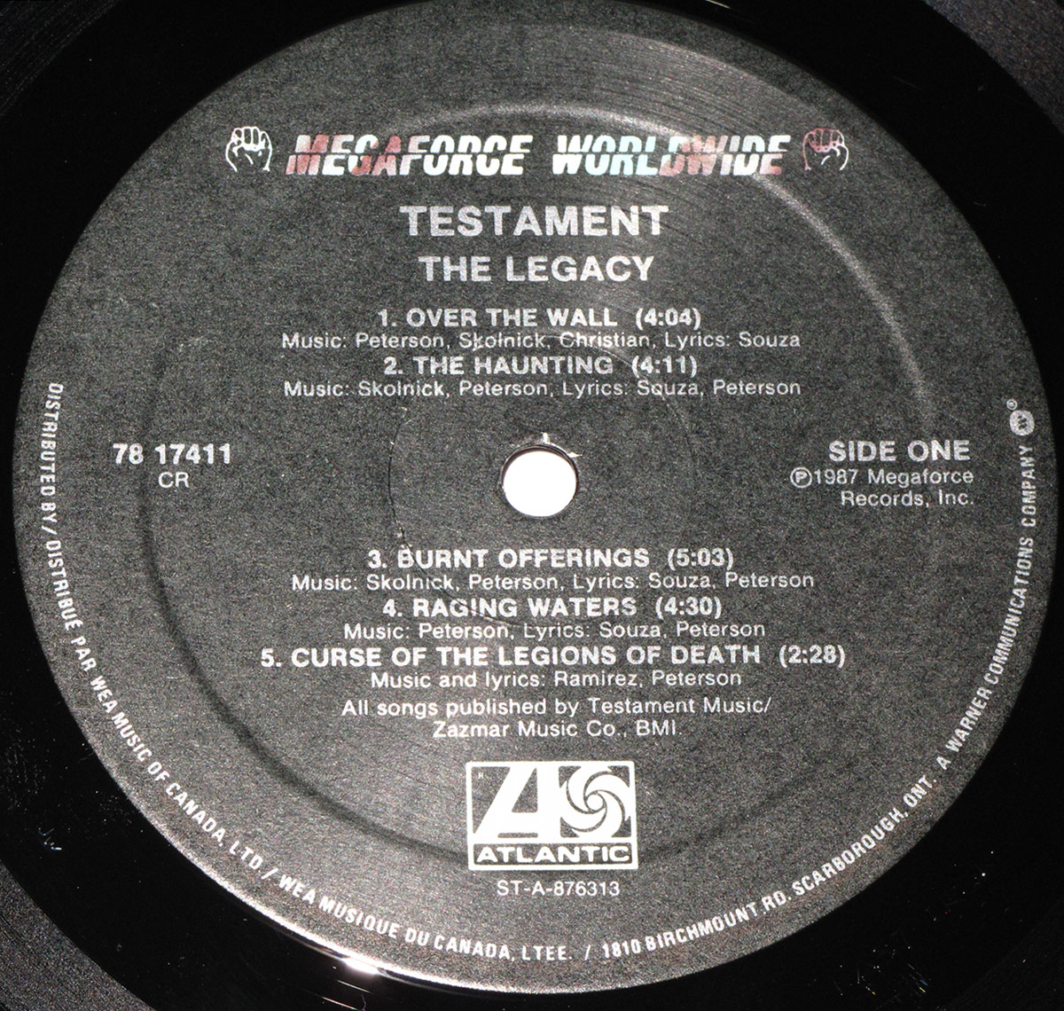 Close up of record's label TESTAMENT - The Legacy ( Canada )
 Side One