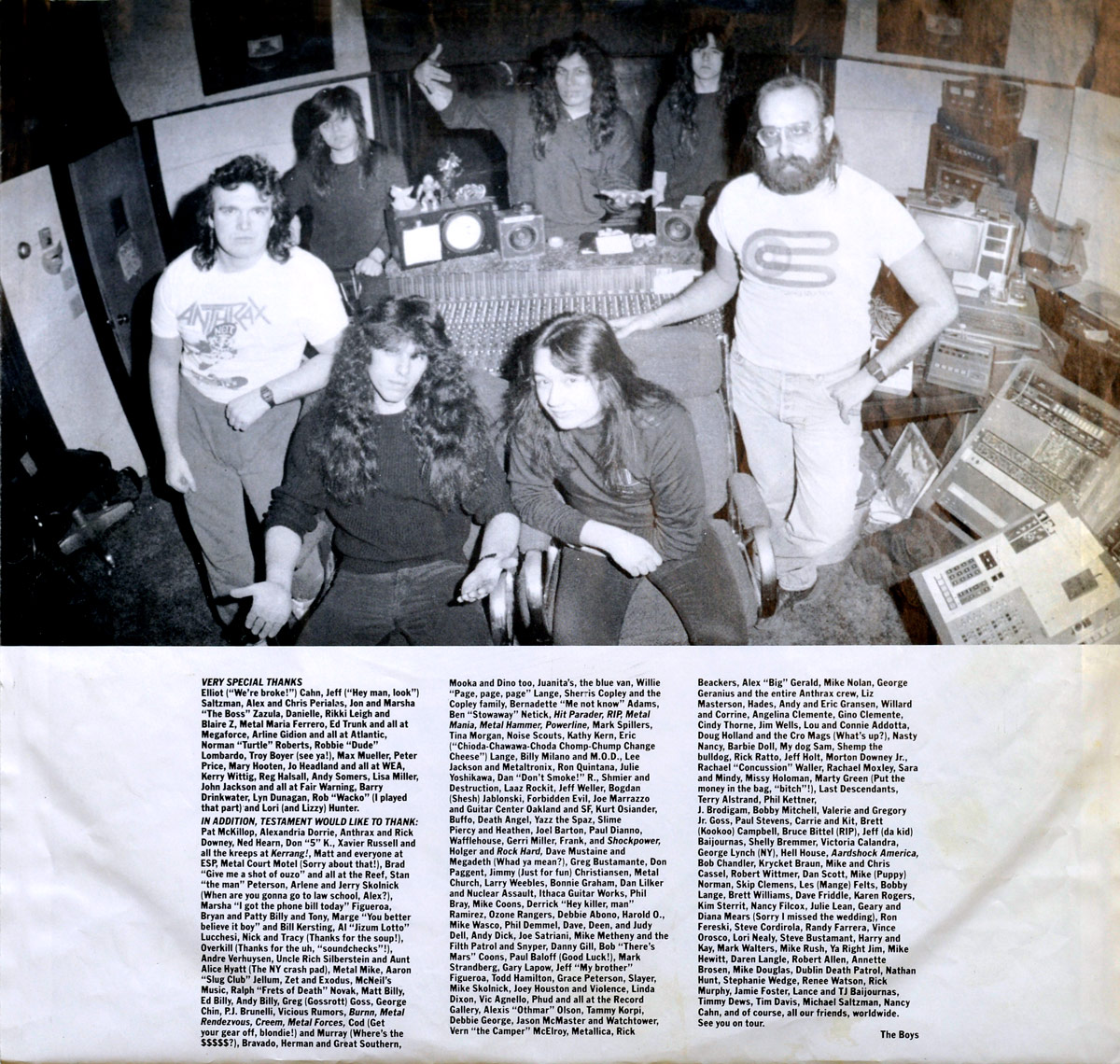 Black-and-white photograph on Testament's 'The New Order' 12" LP album vinyl custom inner sleeve, showing the band and a producer inside a professional recording studio. The band members are gathered around a large mixing console, with analog equipment, reel-to-reel tape machines, and racks of audio gear in the background. Below the image, a dense block of text includes special thanks and acknowledgments.