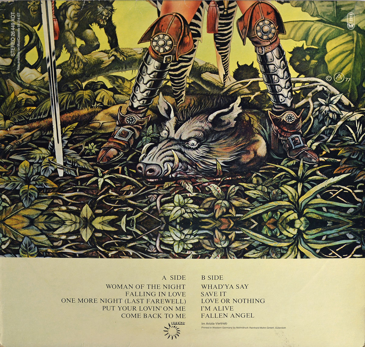 Back cover artwork of Uriah Heep’s 1978 German LP Fallen Angel. The scene depicts armored legs of a warrior woman clad in striped leggings and ornate greaves standing over a slain wild boar in dense foliage. A sword pierces the ground beside the beast. In the shadows behind, dark animalistic figures lurk among the greenery. The lower portion of the cover lists all track titles for Side A and Side B in capital letters, along with label and distribution credits. The background remains rich in greens and yellows, enhancing the fantastical and menacing mood.