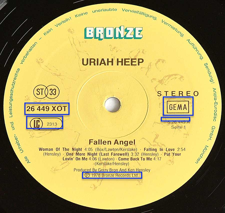Close-up of the German Bronze Records yellow label for Side One of Uriah Heep's 1978 Fallen Angel LP. The circular label features the bold blue Bronze logo at the top, the band name printed centrally in black capital letters, and the album title Fallen Angel below. Tracklist includes Woman of the Night, Falling In Love, One More Night (Last Farewell), Put Your Lovin’ On Me, and Come Back To Me. Catalog number 26 449 XOT and rights society GEMA are clearly displayed alongside the LC 2313 code and ST 33 symbol. Production credit notes Gerry Bron and Ken Hensley with © 1978 Bronze Records Ltd printed at the bottom.